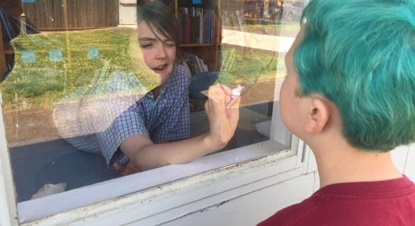 fifth graders created art by outlining each other through our windows